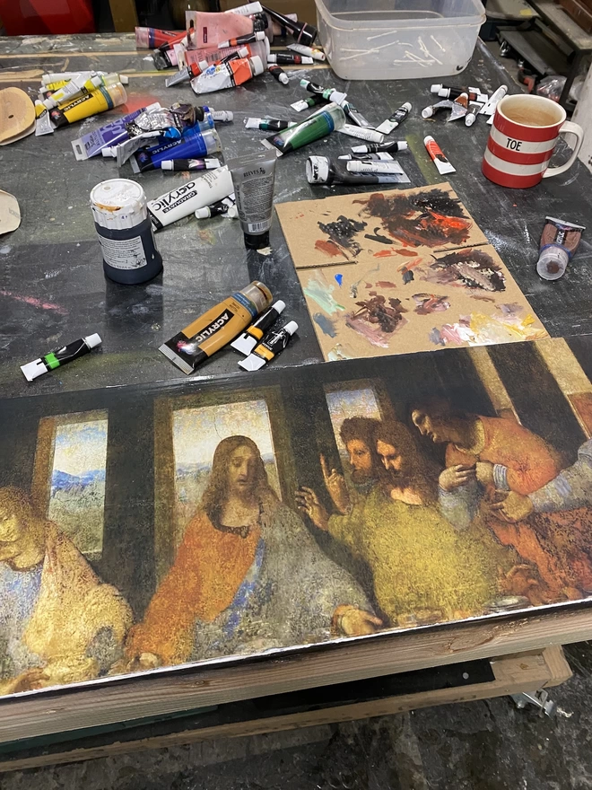 the last supper artwork base in a workshop with paint