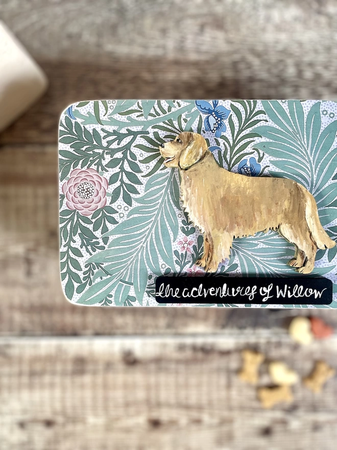 Golden retriever shape mounted onto a wooden dog keepsake box which is inlaid with a William Morris Print in the lid 