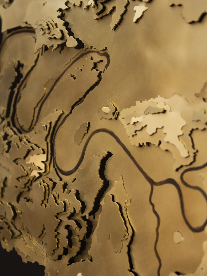 Close up side view of the Paris contour map wall piece with painted black river Seine