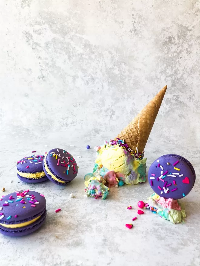 purple macarons with rainbow sprinkles and an ice cream cone