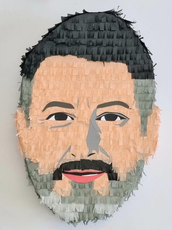 custom made face pinata of a bearded man handmade by pinyatay