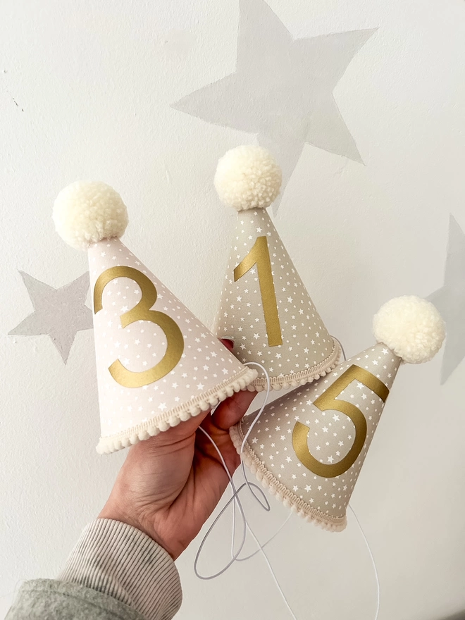 Nude Pink & Taupe Grey Little Star Pritn Party Hats with Gold Numbers & Cream Pom Poms