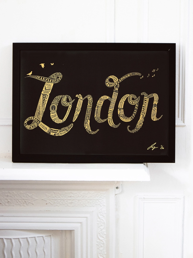 London iconic typographic black and gold framed print