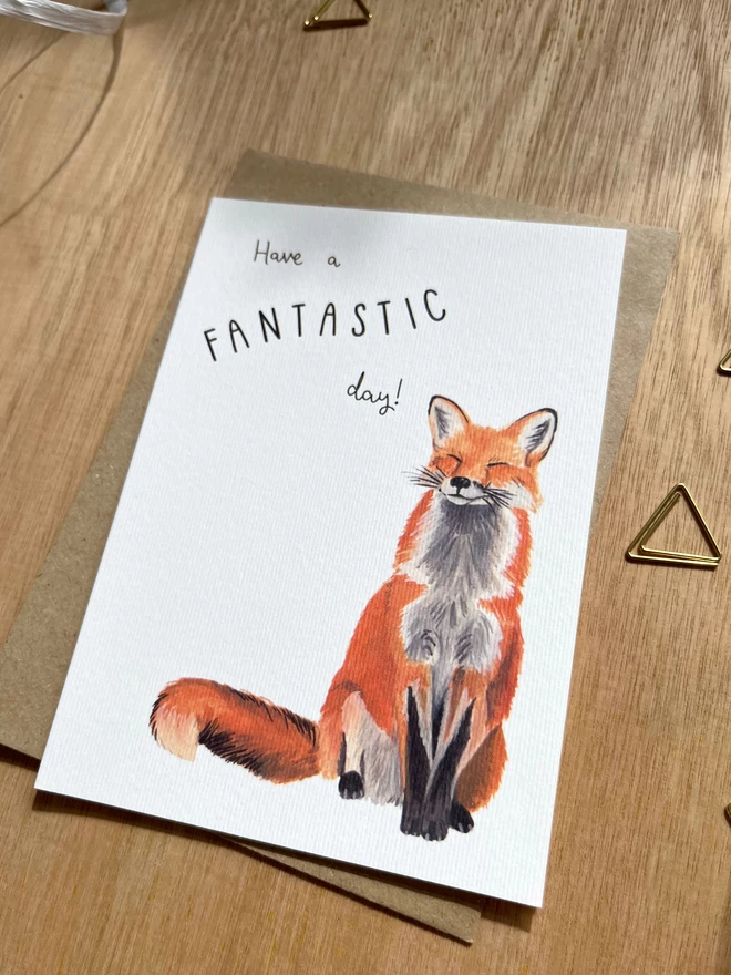 Greetings card with a happy looking red fox and the phrase ‘have a fantastic day”