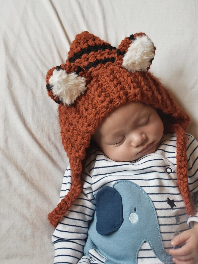 Baby in tiger hat