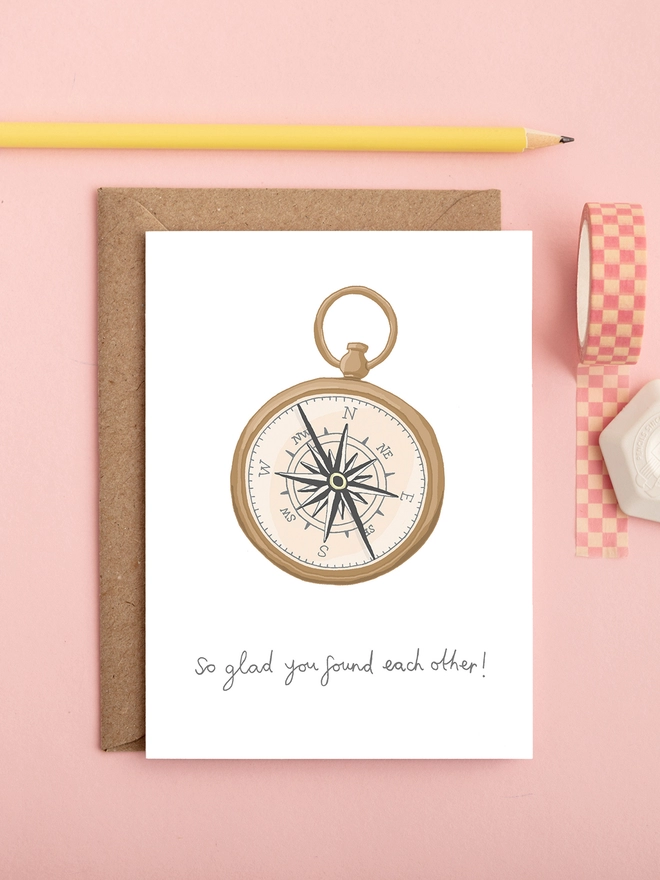 Cute wedding or engagement card featuring a compass