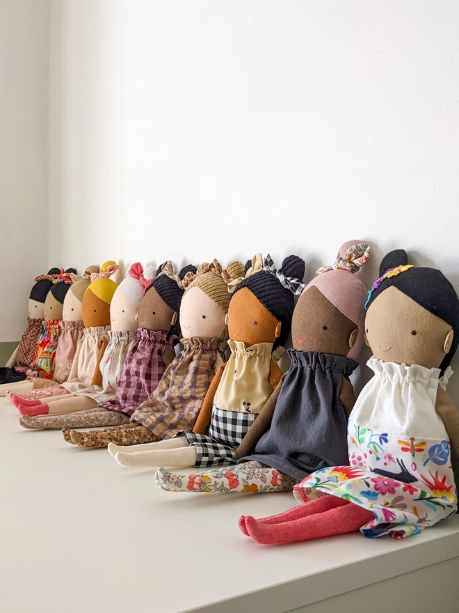 handmade multi cultural girl dolls in different skin tones and outfits