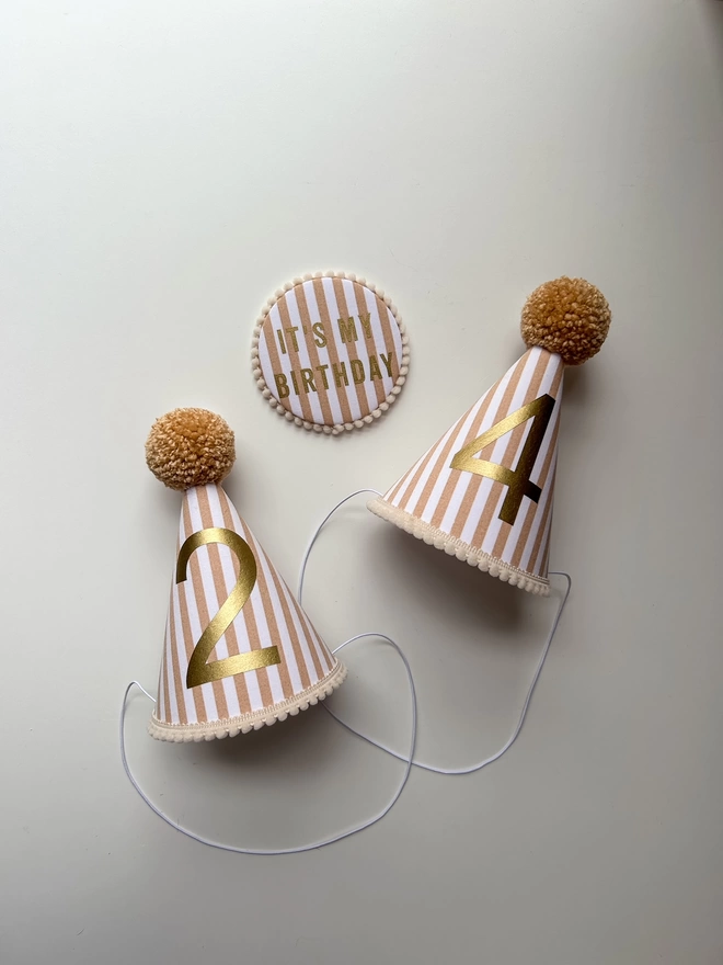 Caramel Striped Party Hats with Caramel Pom Poms and Birthday Badge