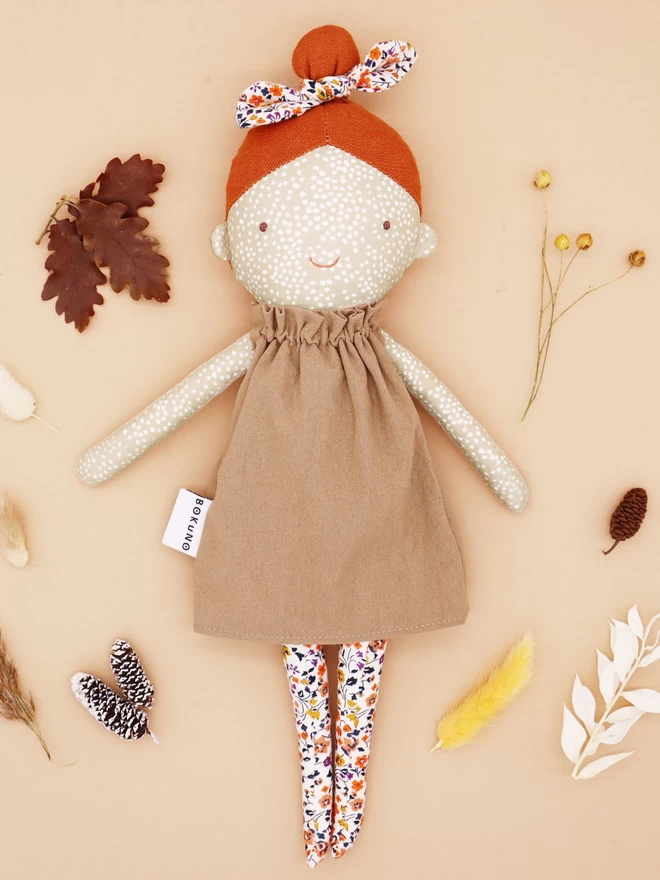 fabric girl doll with freckle face and redhead