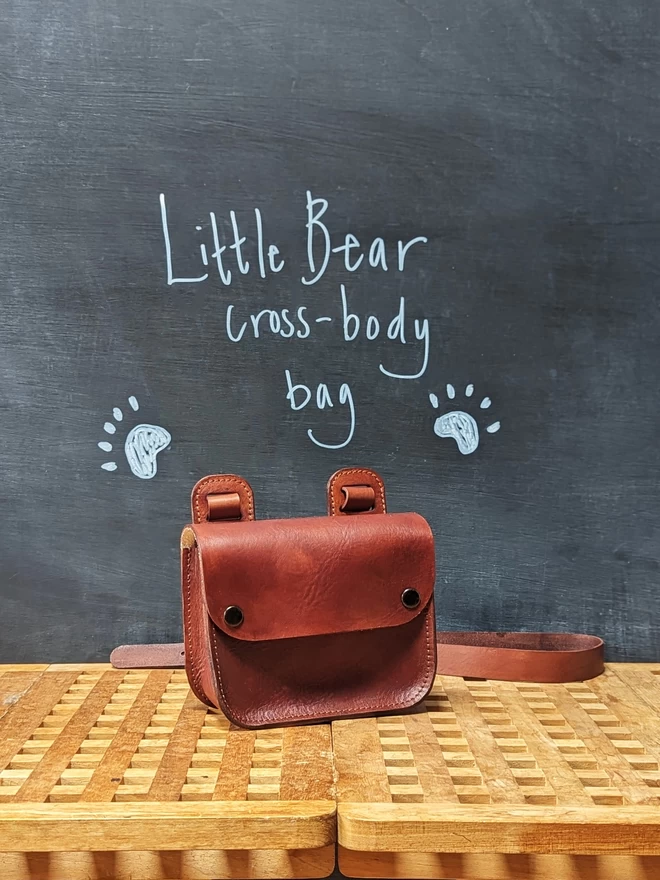 Hand dyed Leather 'Little Bear' cross- body bag, front view.