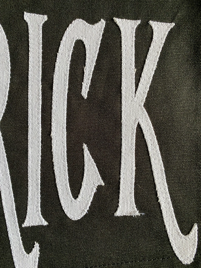 Detail of a Trick or Tequila pennant flag. 