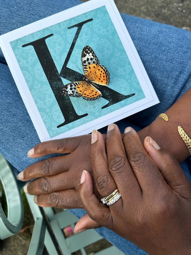 Recipient holding their personalised birthday butterflygram  