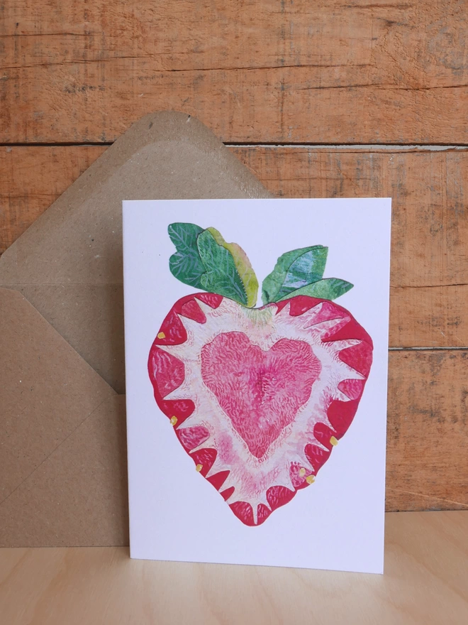 The front of Strawberry Heart Card alongside to brown kraft envelope