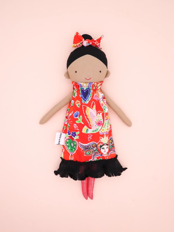 Frida Kahlo inspired mexican girl doll with bright red dress 