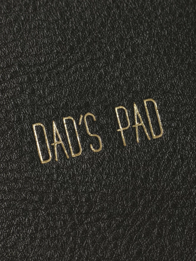 Tall font in gold, Dad's Pad