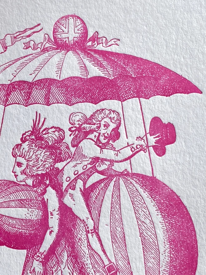 Close up of white card with pink illustration of a man and a woman