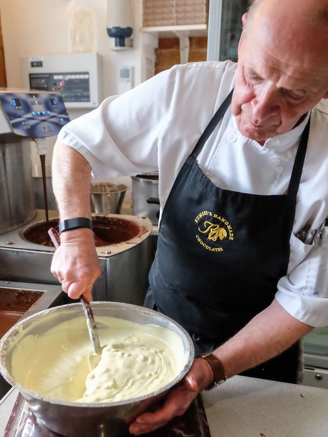 Nigel Rumsey tempering a bowl of white chiocolate