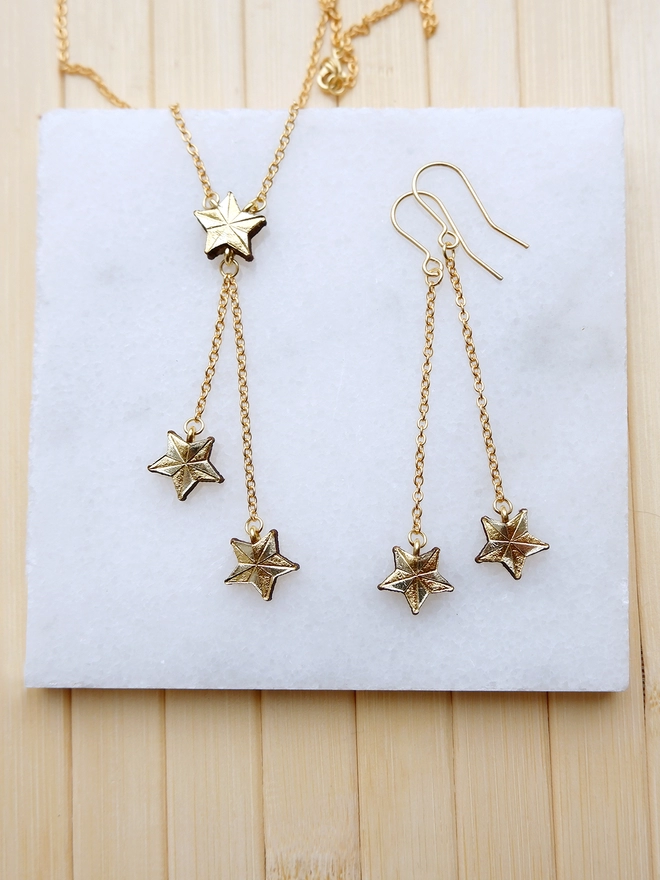 tiny gold leather star necklace