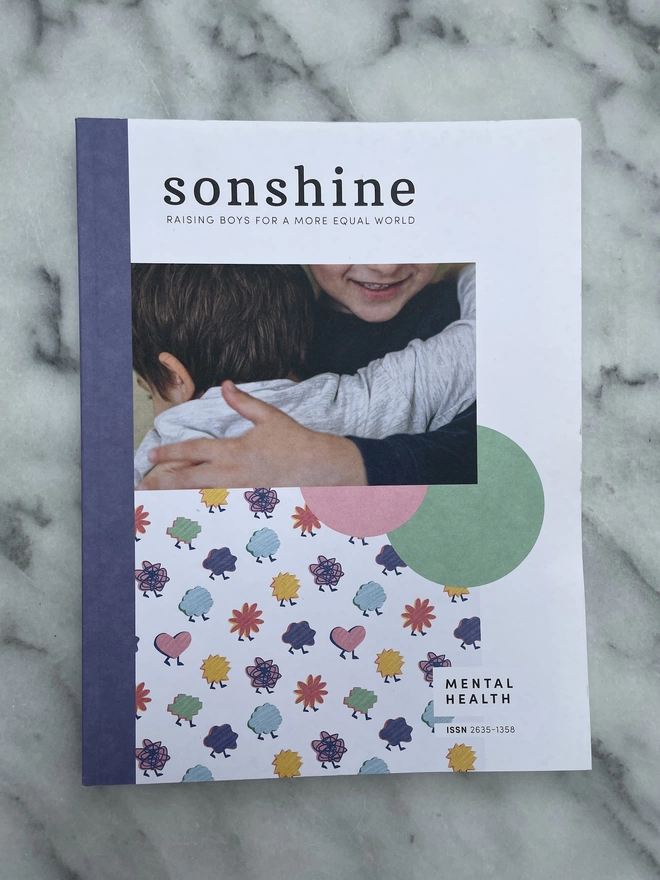 Sonshine Magazine Issue 17: Mental Health a paper magazine featuring a photograph of two children hugging each other