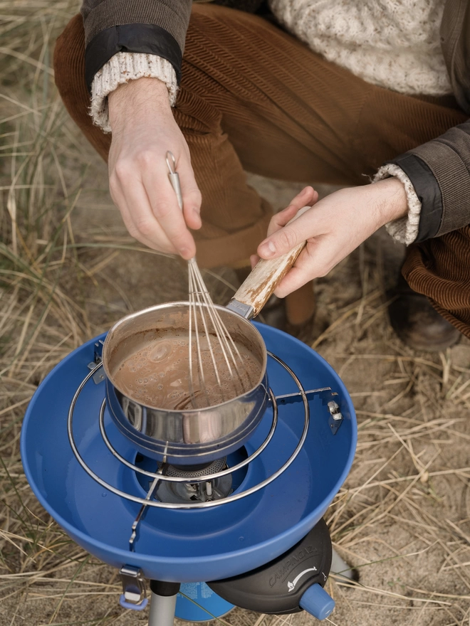 Making Harth hot chocolate on the beach 