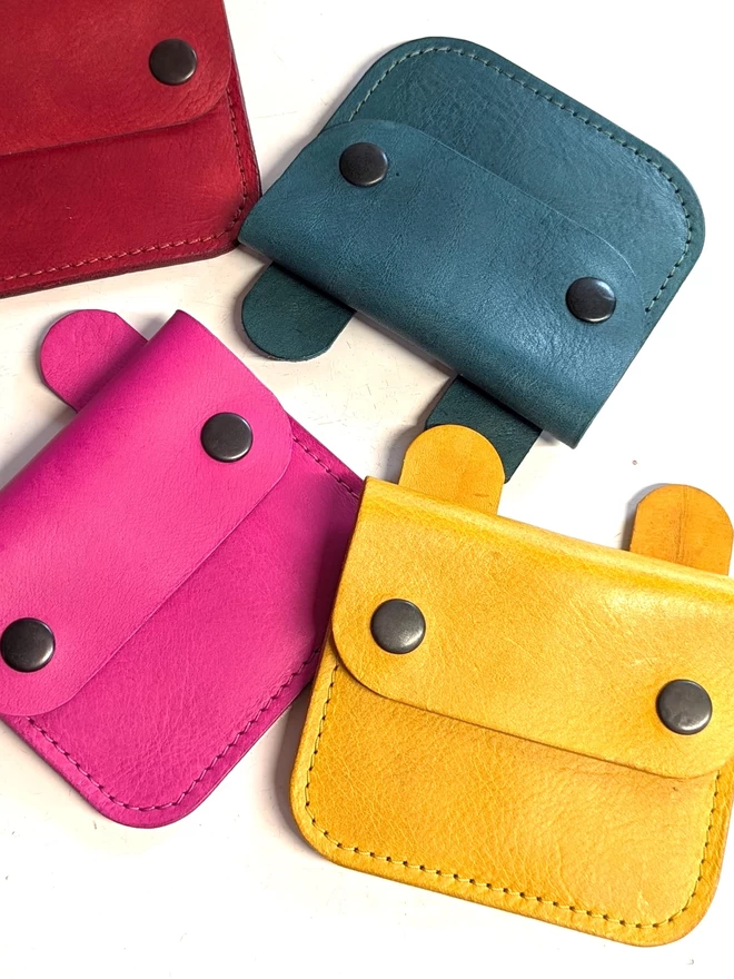 Image of leather 'Tiny Wild' Bunny purses in assorted colours.