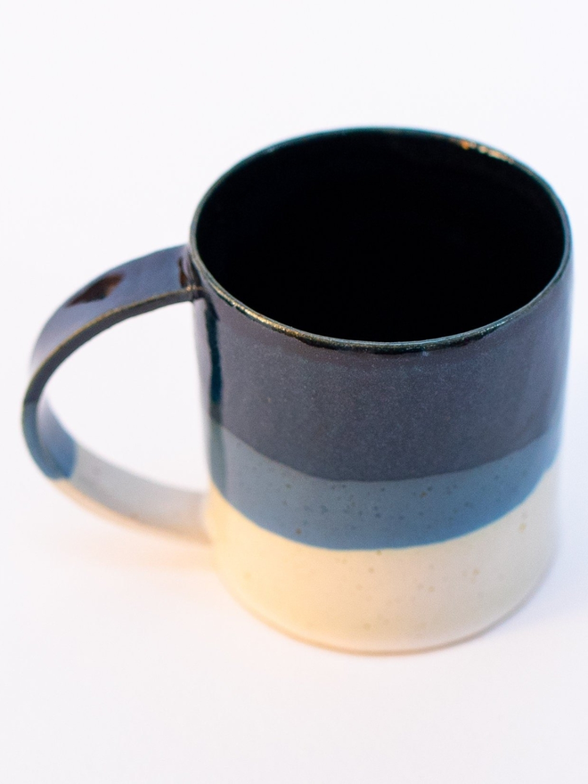 blue and white handmade ceramic mug