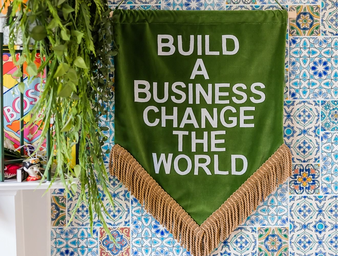 'Build a business, change the world' flag
