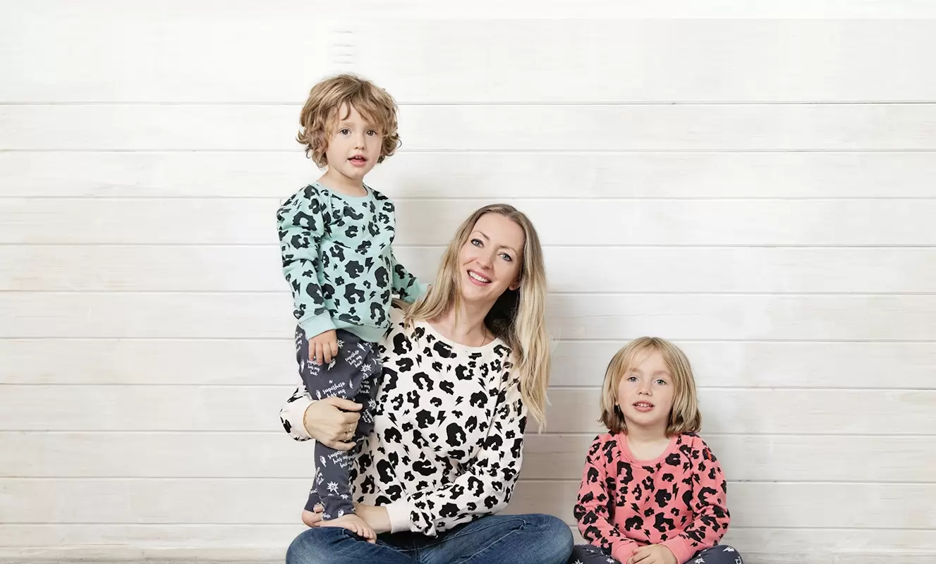 Jo Tutchener-Sharp, founder of Scamp & Dude, with her children