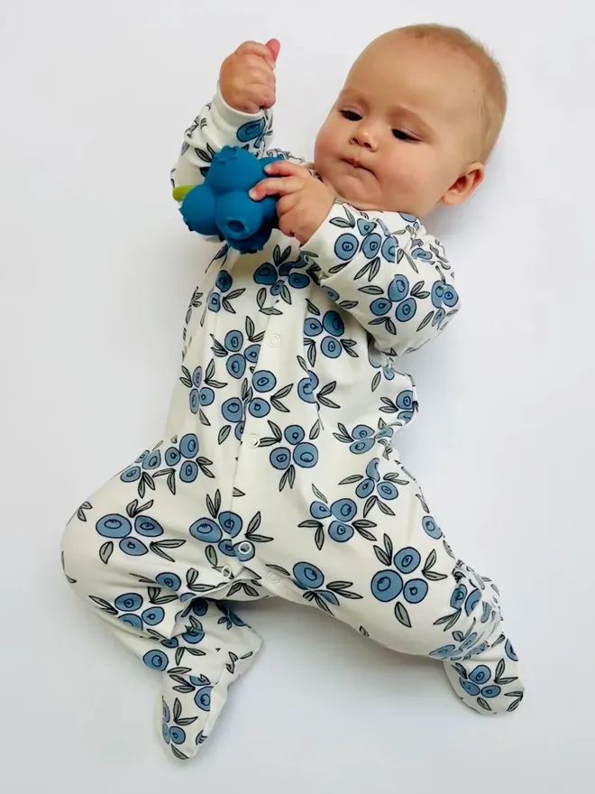 Organic Cotton Baby Sleepsuit in Cream "Blueberry" Print.