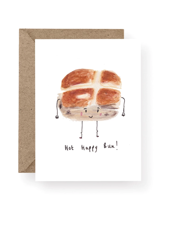 Alternative Easter Card Featuring a Smiling Hot Cross Bun.  The Card Reads Hot Happy Bun.
