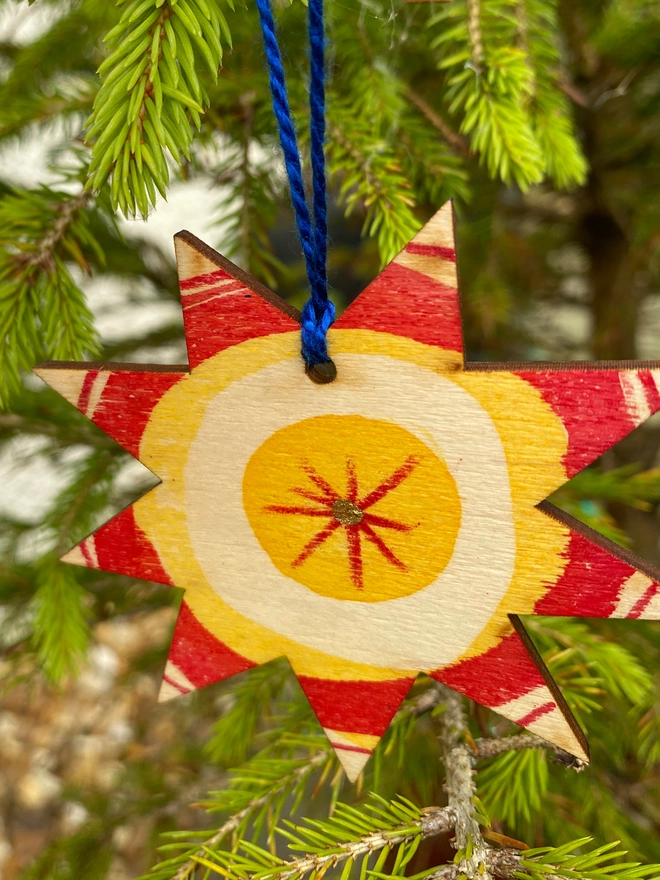 Esther Kent hand painted wooden star and circle decorations in red and yellow