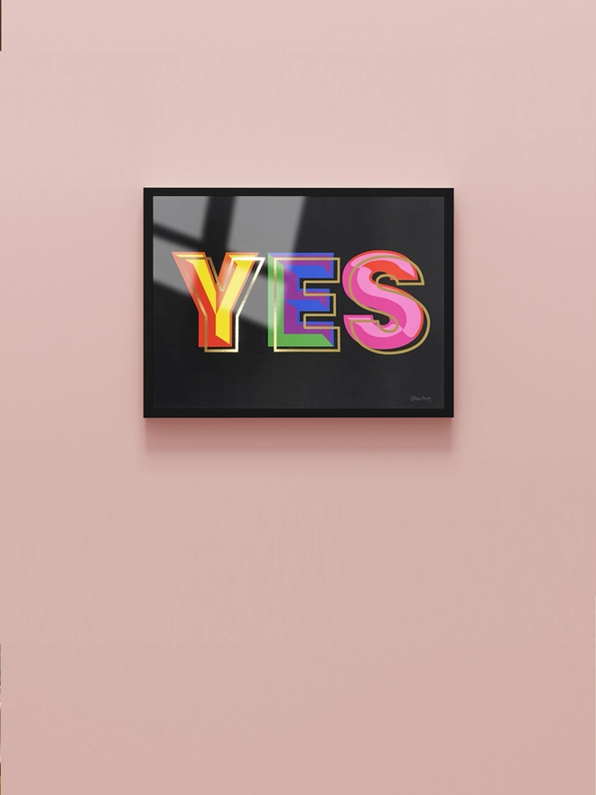 A4 Yes print, shown in a black frame