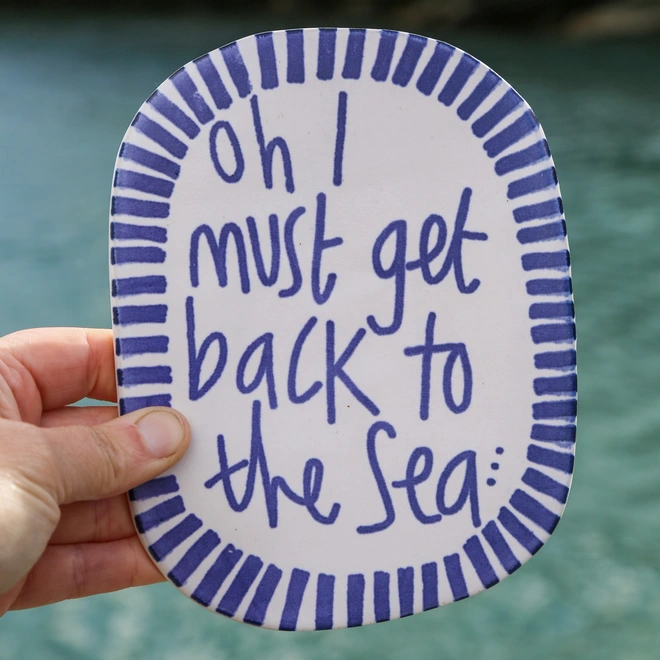 Oh I must get back to the sea wall plaque