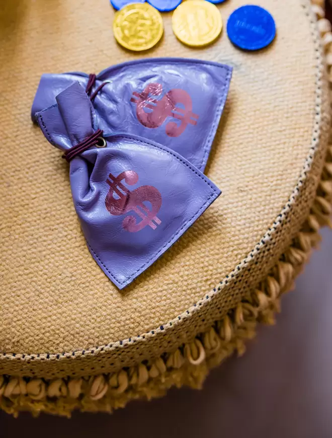 Purple leather coin purse by Nat Thakur