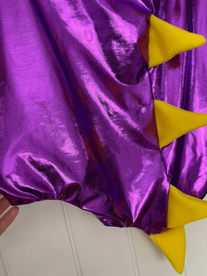 Close Up of Purple Dinosaur Dragon Dress Up Wings Cape