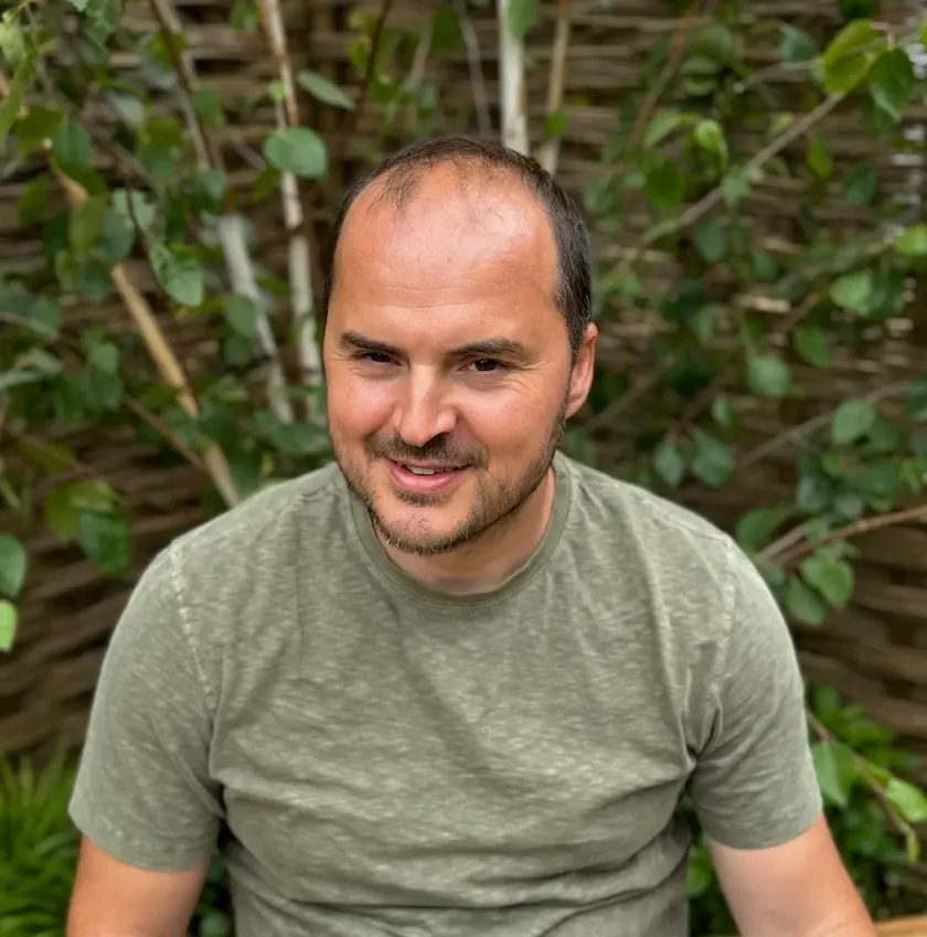 herman smiling at the camera