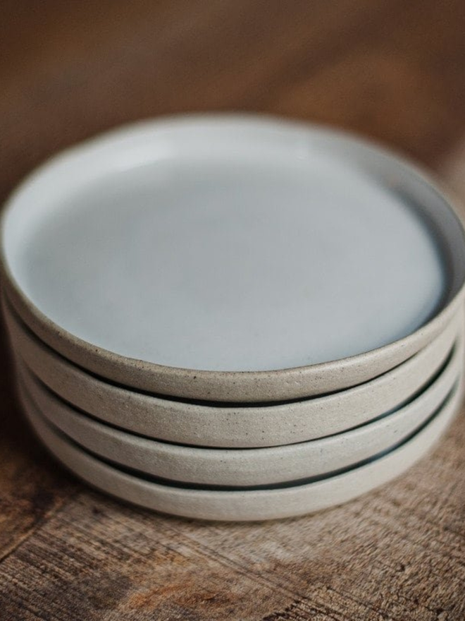 white ceramic dinner plate stack