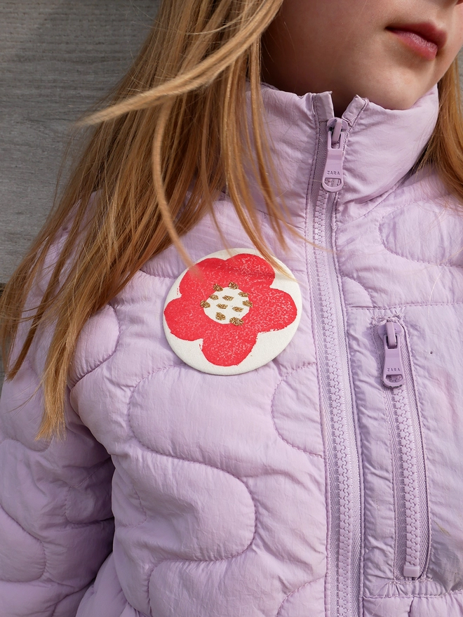 hand block printed red flower badge
