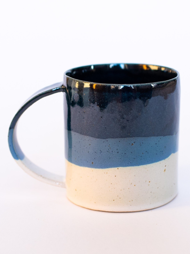 blue and white handmade ceramic mug