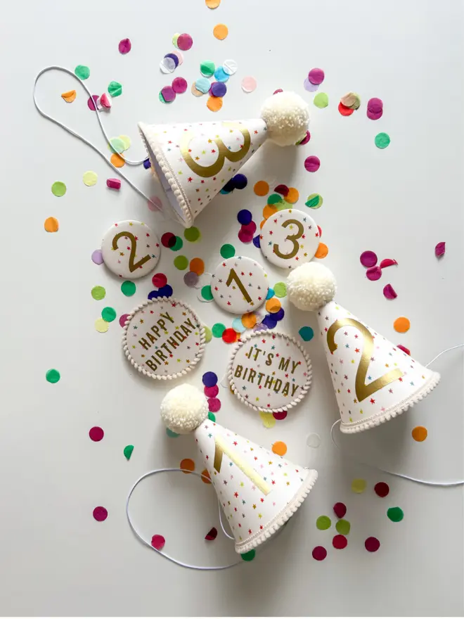 Party Hats and Birthday Badges in a Multi Colour Star Print