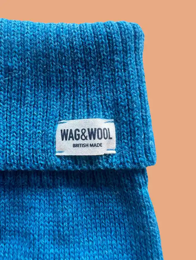 blue dog jumper label close up