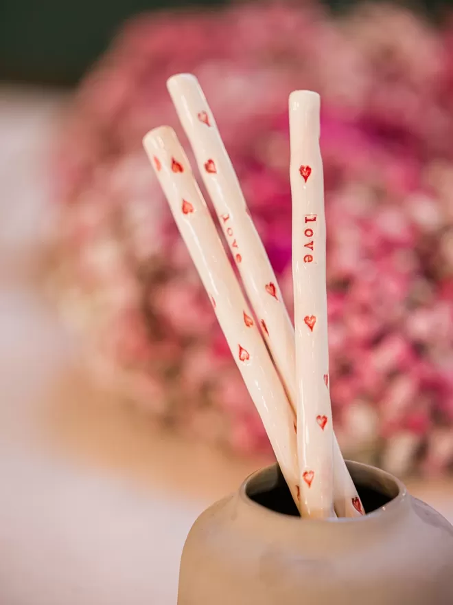 Love straws with red hearts