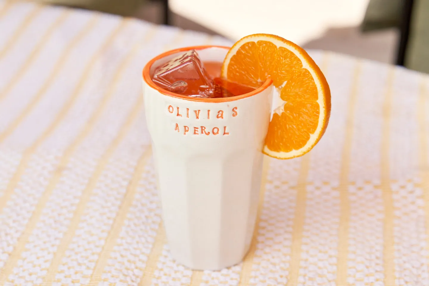 Ceramic hand-stamped aperol tumbler