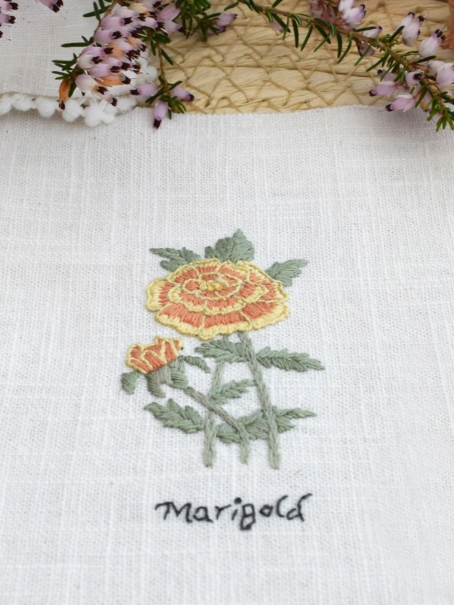 Floral Botanical embroidery kit of Marigold or Tagetes a symbol for October.  Meaning Warming sunbeams, Passion, Creativity, Grief and The sun.