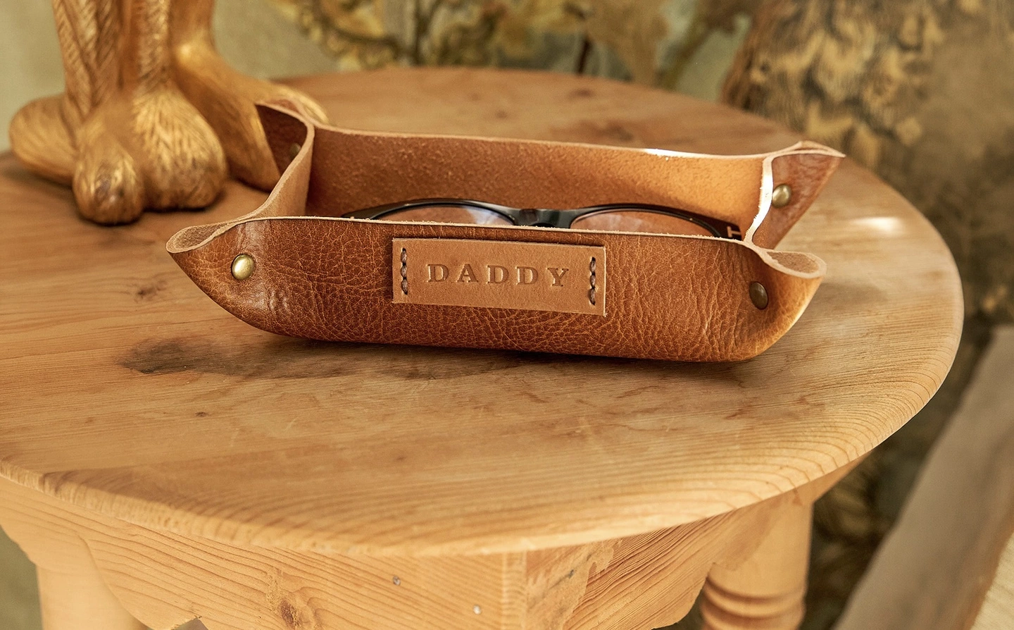 Personalised Leather Coin Tray. A coin tray with the phrase 'Daddy' stamped on the front