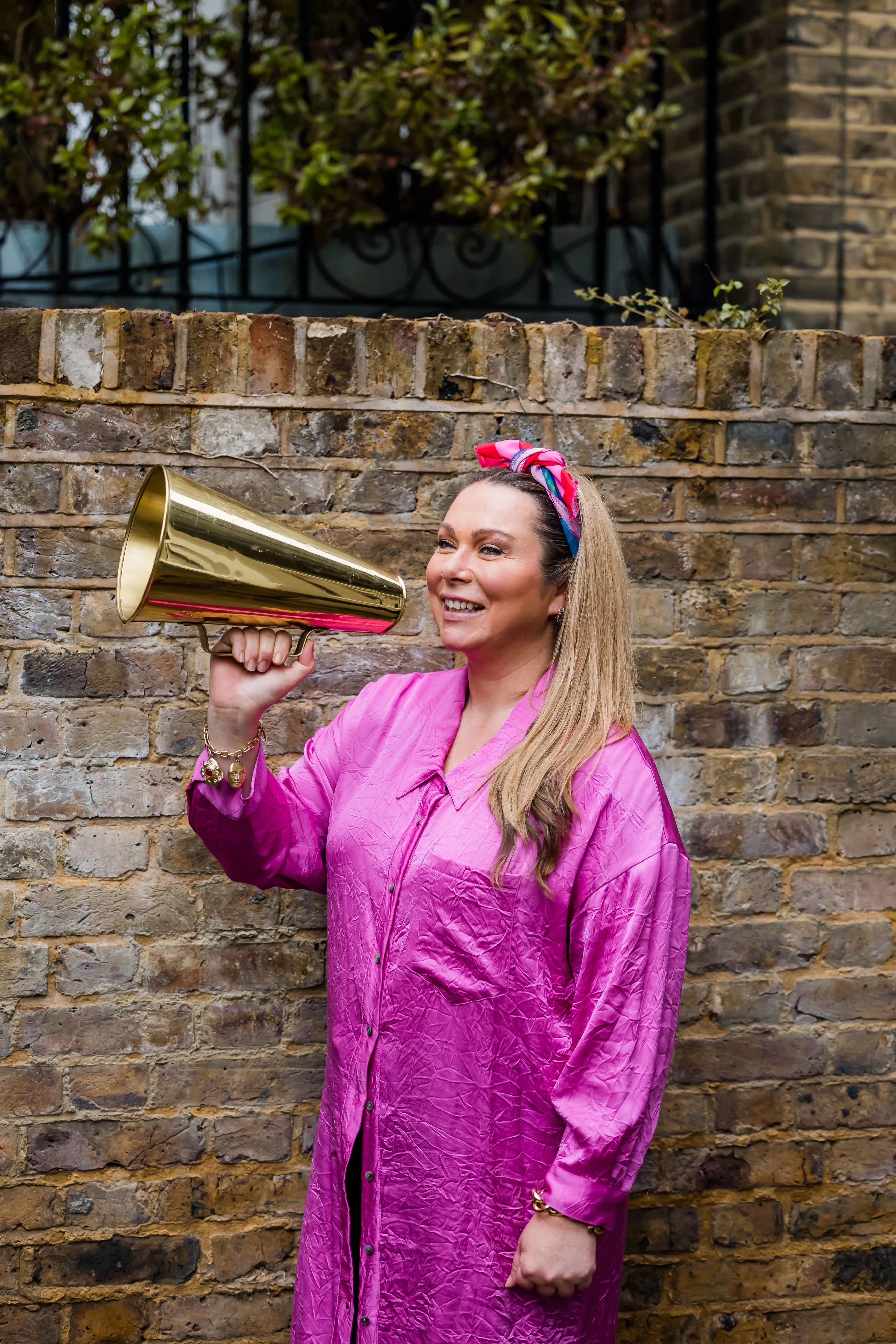 Holly with a gold megaphone