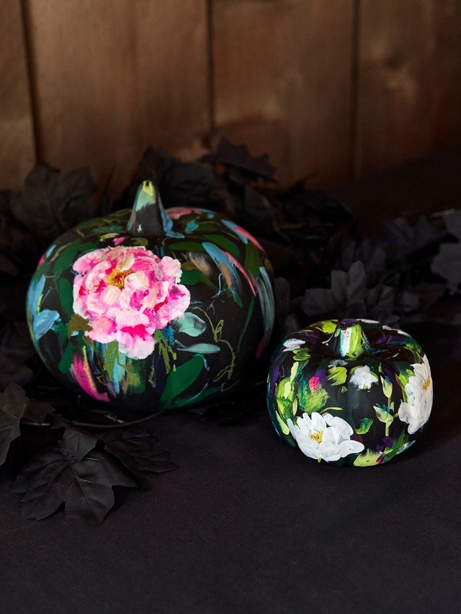 hand painted floral pumpkin black background adorned with white peonies 