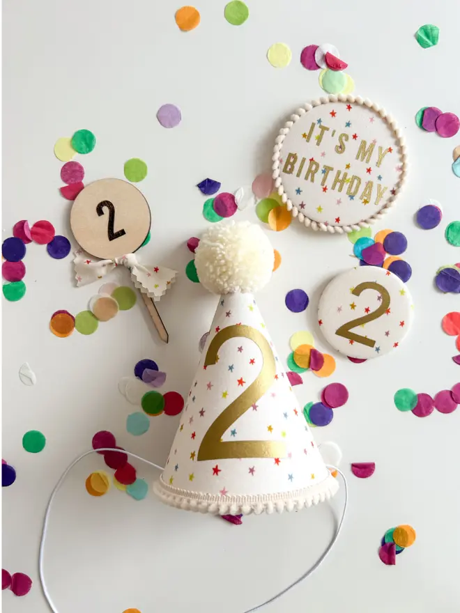 Party Hat and Birthday badges in a Multi Colour Star Print