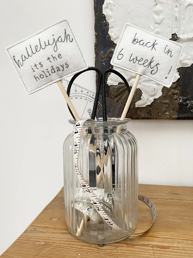 Teacher Thank You Embroidered Sign in glass vase with scissors