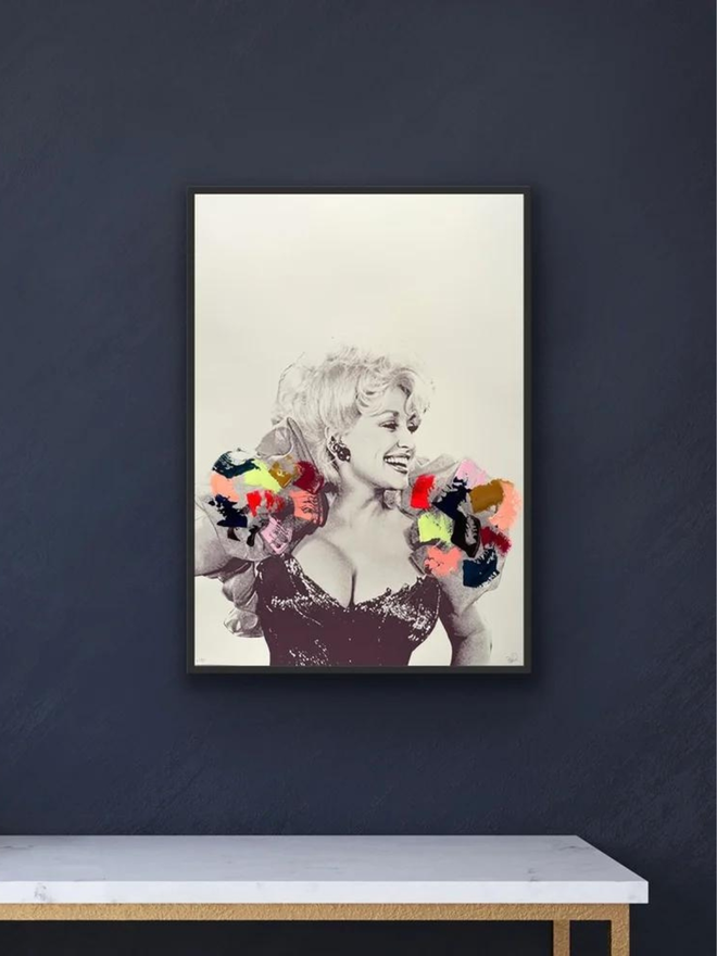 dolly parton screen print hand finished with paint on navy wall